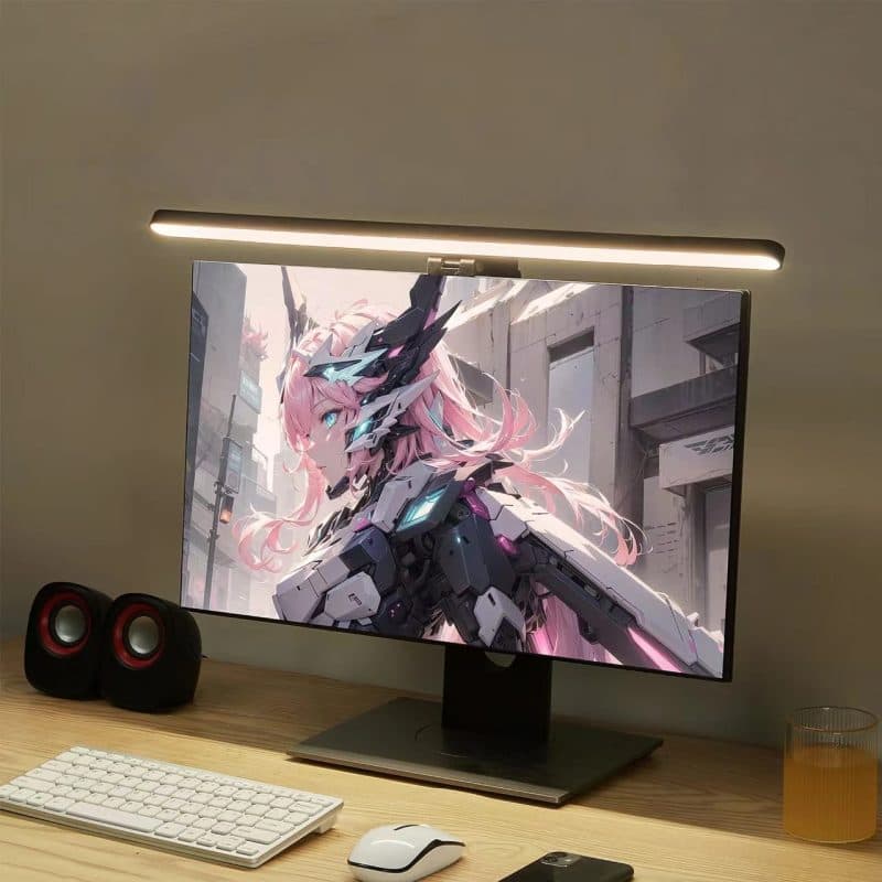 Barra de luz sobre un monitor iluminando el escritorio