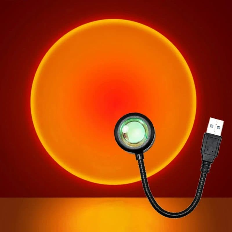 Lámpara USB proyectando un atardecer en la pared
